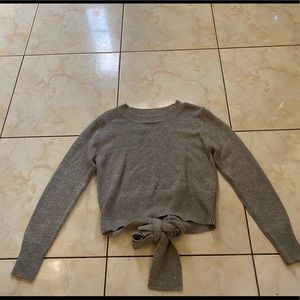 Grey sweater with open back